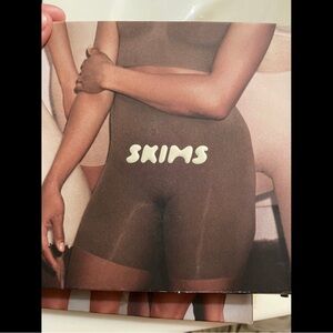 SKIMS womens high waist above the knee short
